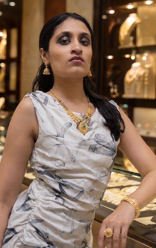 Balakrishna gold worn at the Stadium showroom — kasumala, temple jhumka and stone ring