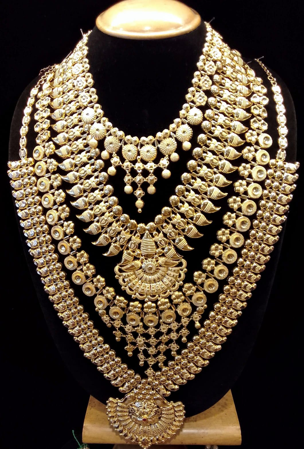 A grand nakshi layered bridal set, hand-finished at the Balakrishna bench