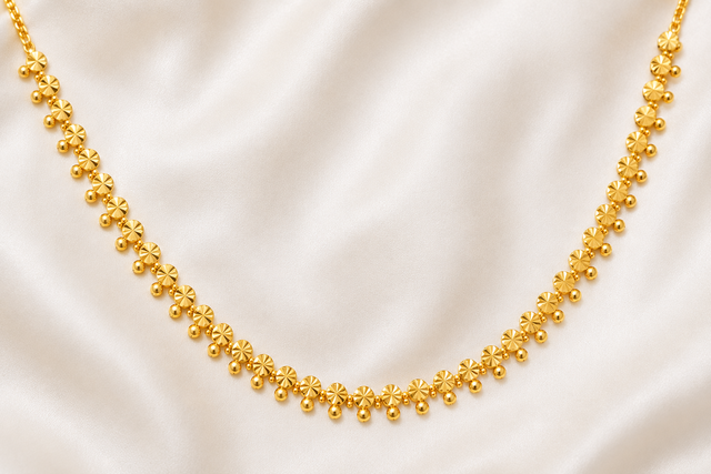 An illustration of a cheruthali chain — the fluted gold discs of the marriage chain