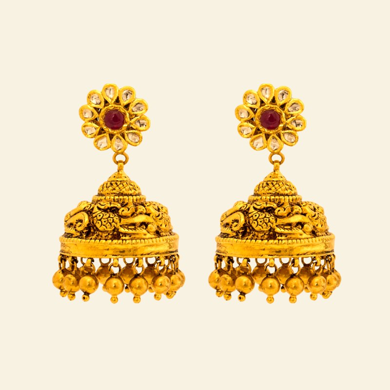 A pair of temple jhimki — kemp-set florets above, elephant-worked bells with gold-bead drops
